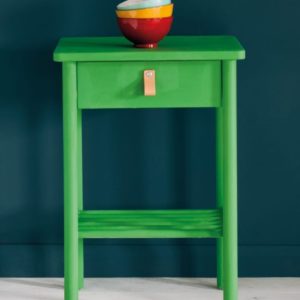 Side table painted with Chalk Paint® in Antibes Green, a bright neoclassical green against a wall of Aubusson Blue