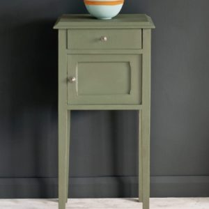 Side table painted with Chalk Paint® in Chateau Grey, an elegant greyed green against a black wall of Graphite.