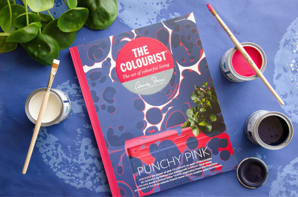 Flat lay of The Colourist Issue 6 surrounded by Capri Pink, and Old White Chalk Paint®
