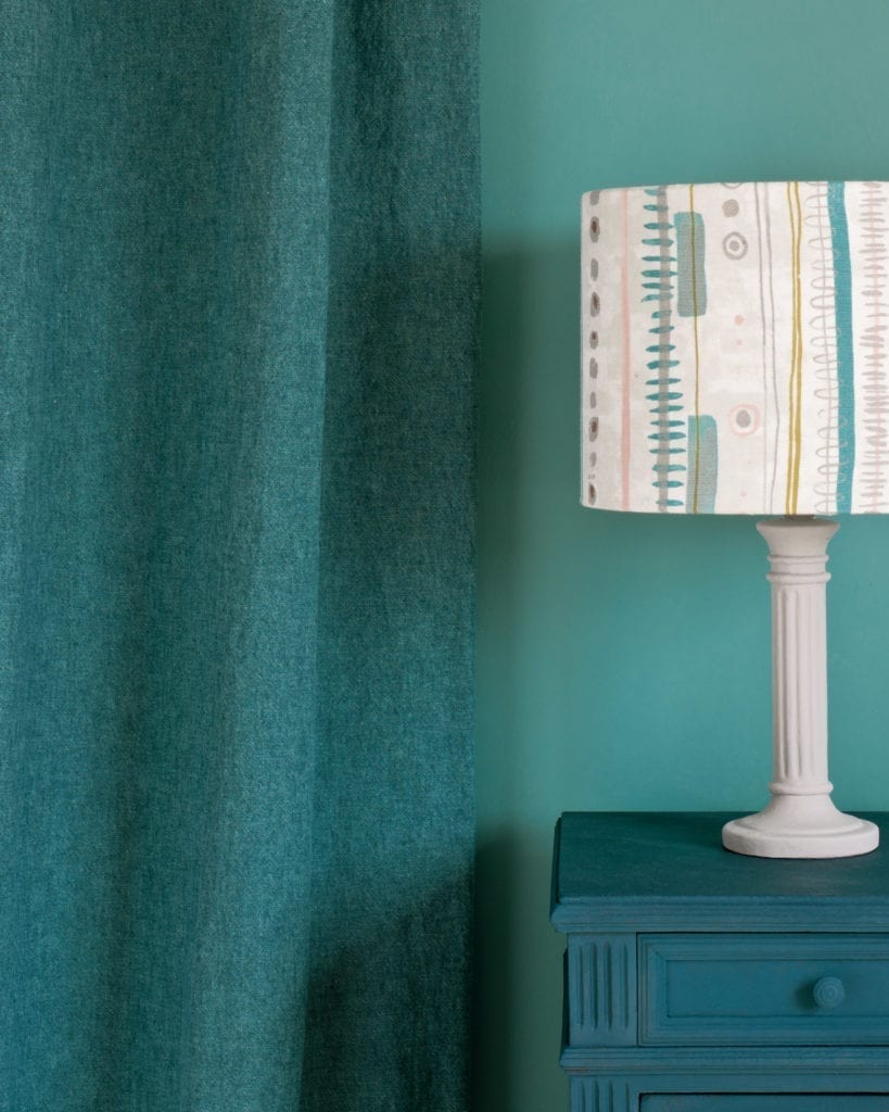 Linen Union fabric by Annie Sloan in Provence + Aubusson Blue curtain, Chalk Paint® in Aubusson Blue side table, Piano in Provence lampshade and Provence Wall Paint