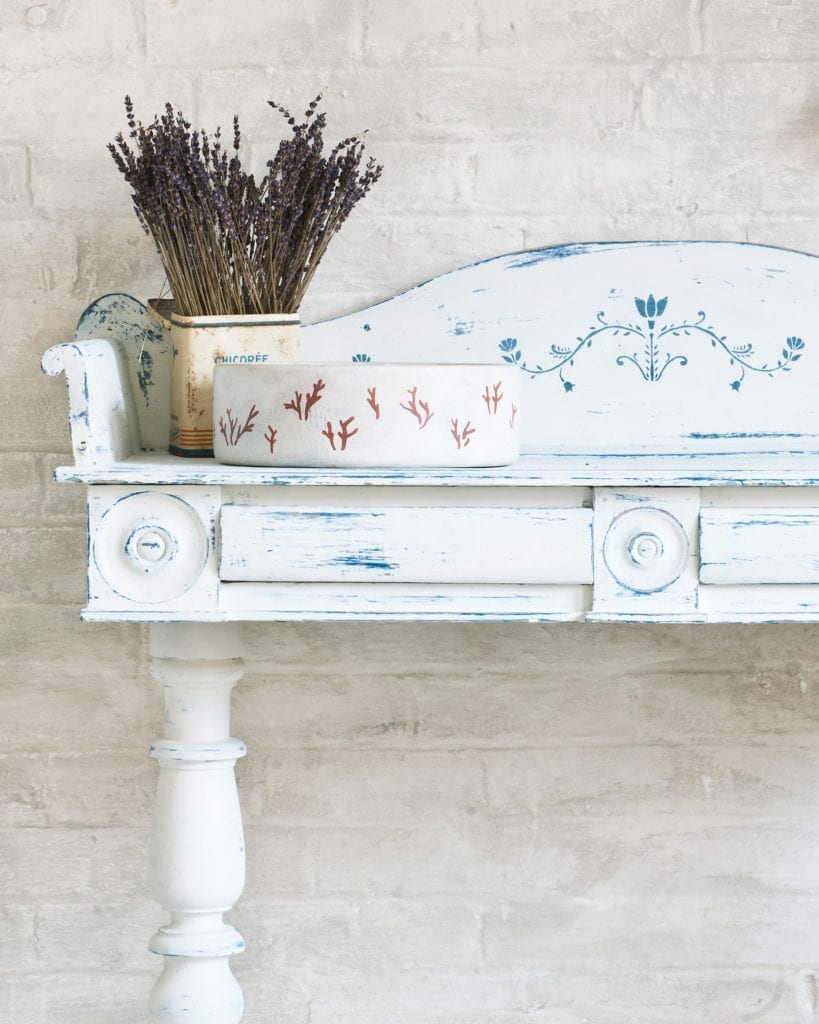 Pot painted with Chalk Paint in Old White and stencilled with Coral Stencil by Annie Sloan in Burgundy