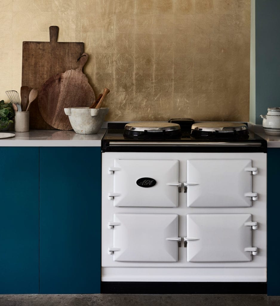 Kitchen painted with Chalk Paint® by Annie Sloan in Aubusson Blue with a gilded Imitation Gold Leaf splash-back