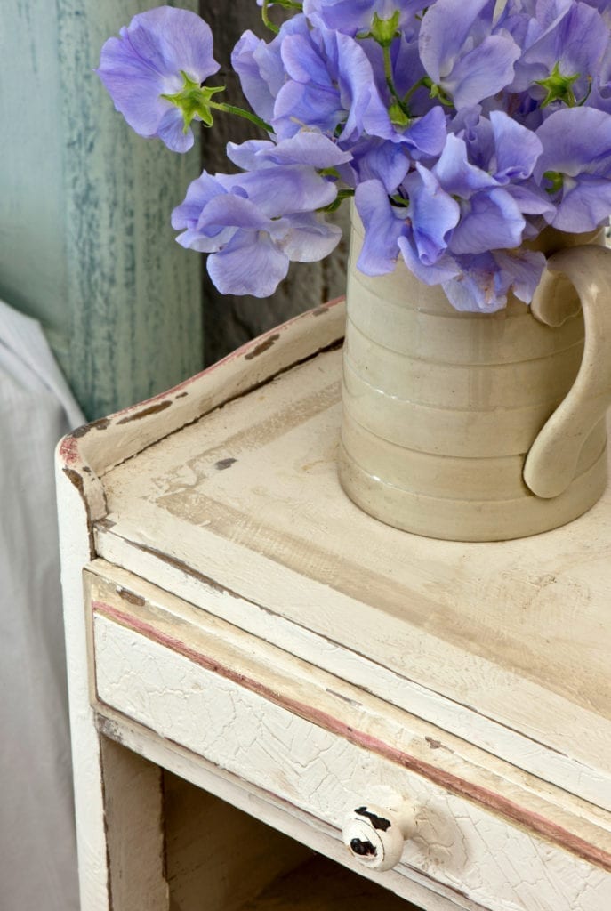 Rustic Chipped Chalk Paint® bedside table by Annie Sloan from her French Normandy Farmhouse