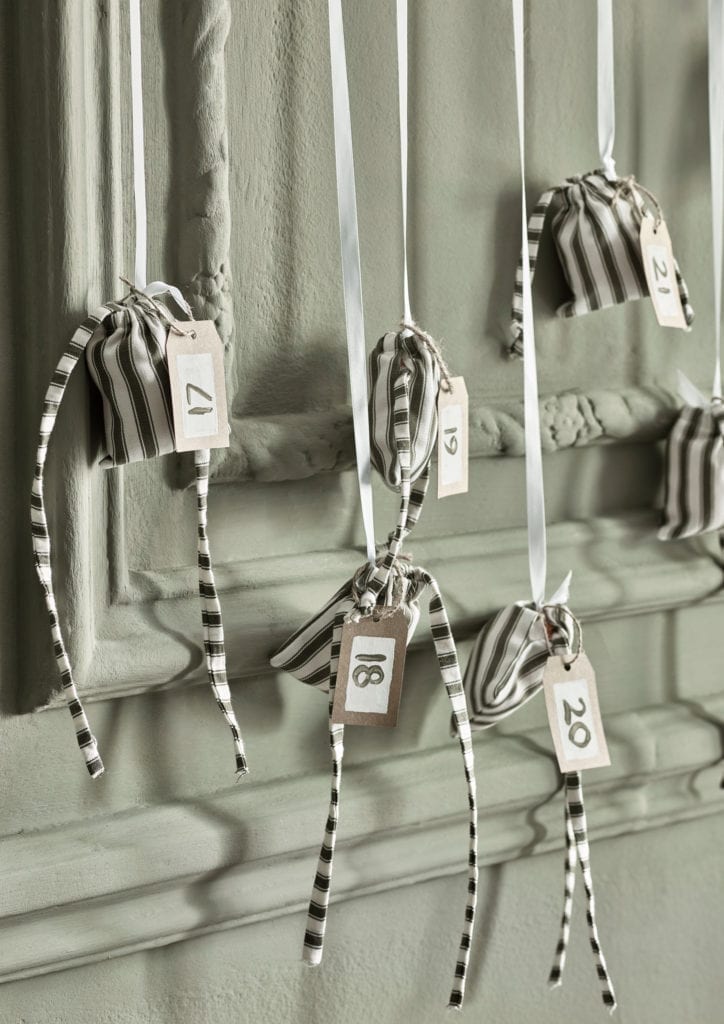 Scandinavian style Christmas dining room - advent calendar made from Annie Sloan fabric Ticking in Olive