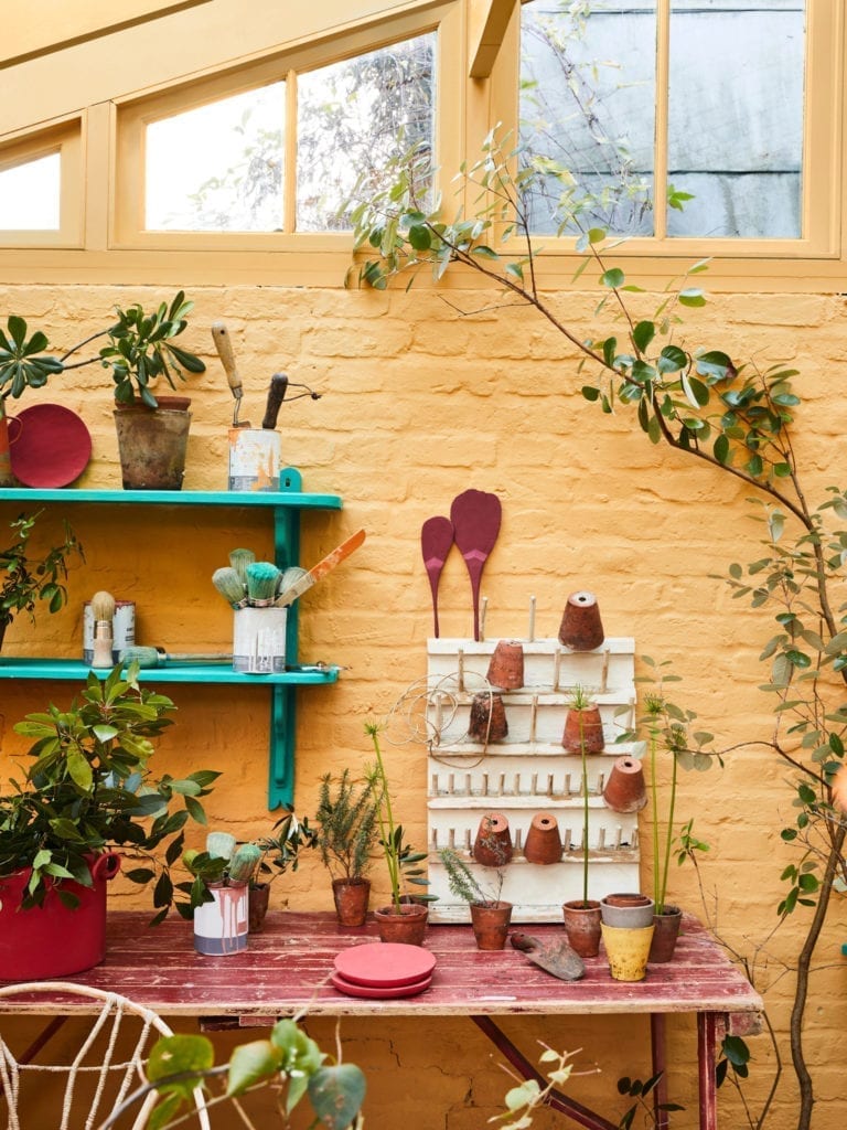 Sun room painted with Chalk Paint® by Annie Sloan in Arles. Shelves in Provence and details in Burgundy