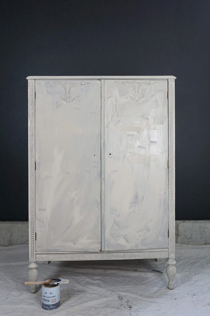 Olivia Lacy's Chalk Paint® cabinet after one coat of paint