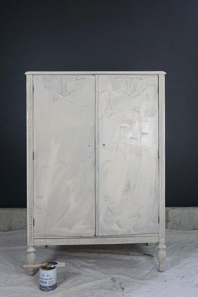 Olivia Lacy's Chalk Paint® cabinet after one coat of paint