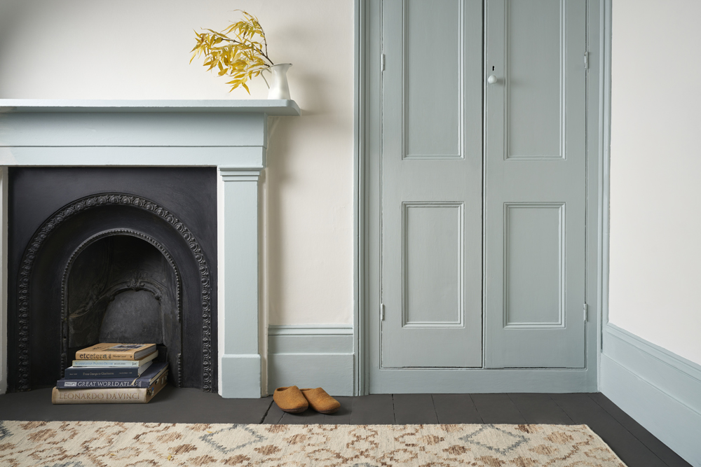 Living Room Featuring Satin Painted Cupboard Doors and Fireplace in Annie Sloan Upstate Blue