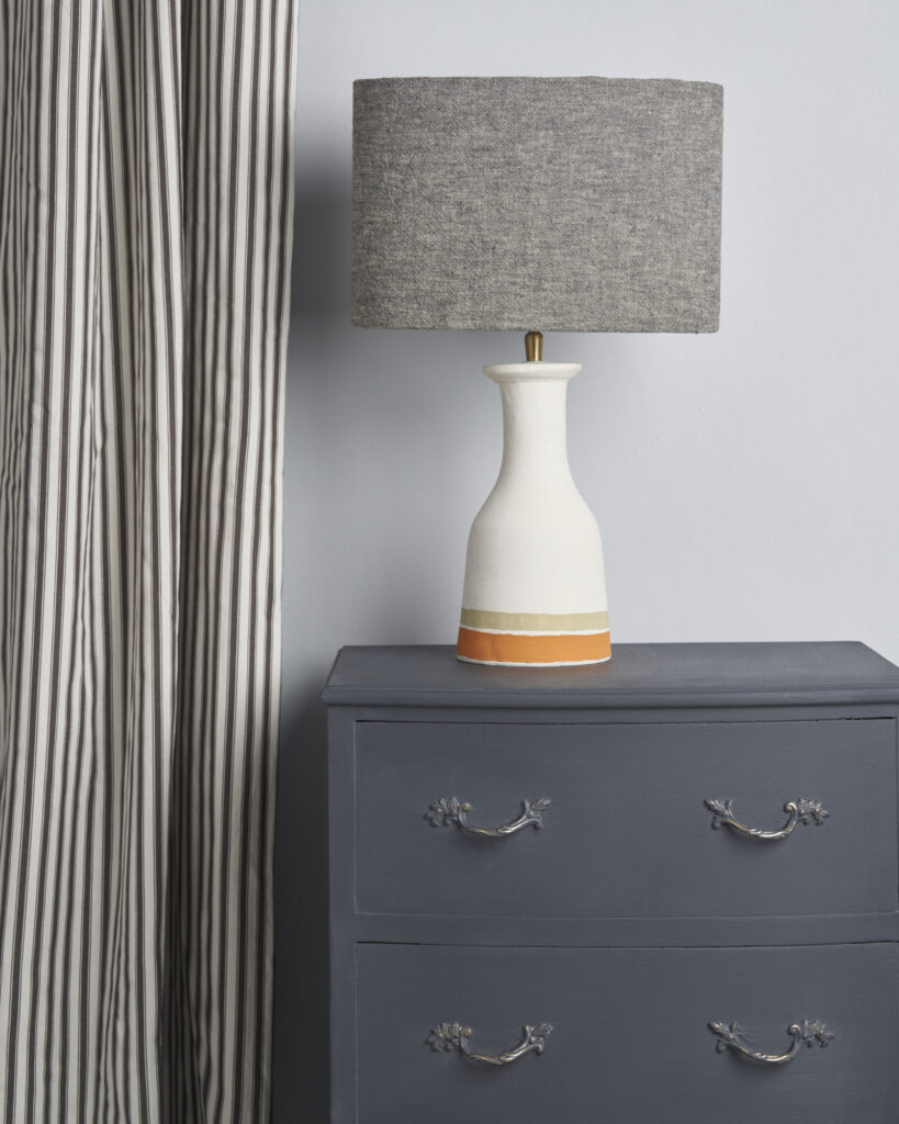 Close Up Side Table Painted in Whistler Grey Chalk Paint by Annie Sloan. Featuring Fabric Lamp and Curtains