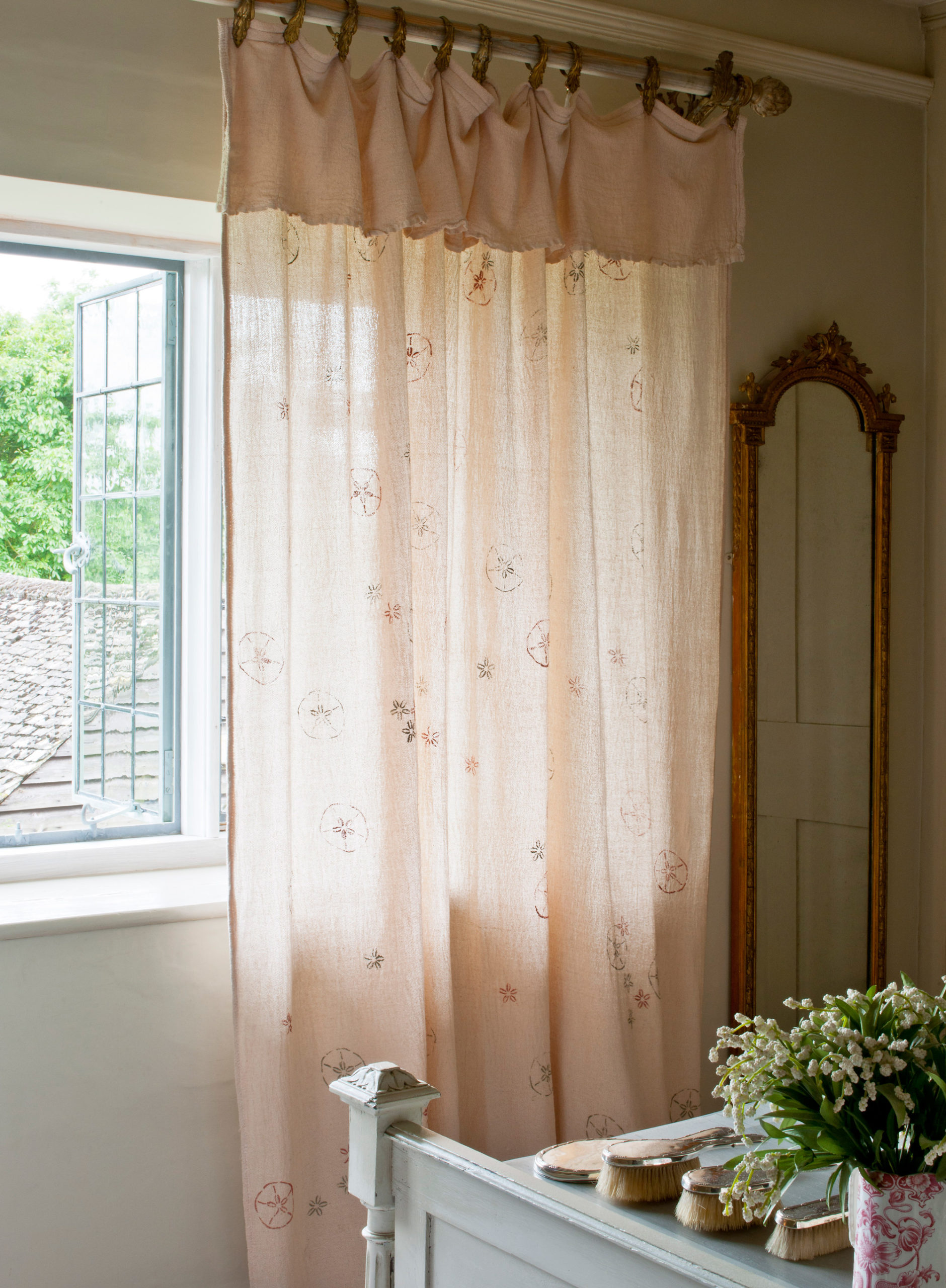Dyed and stencilled Chalk Paint® dust sheet curtains by Annie Sloan credit CICO books