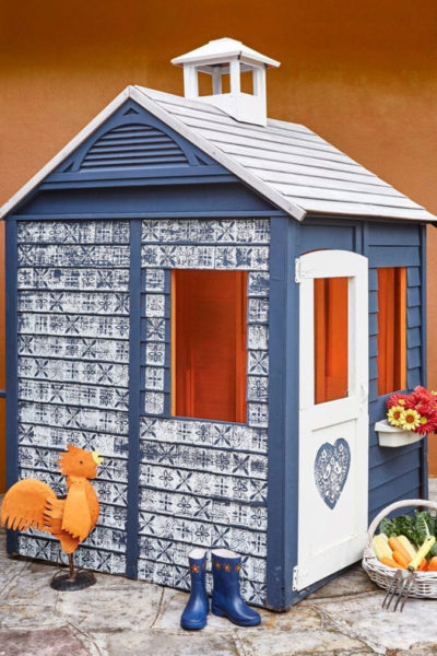 Ukrainian Folk Art Playhouse by Annie Sloan Painters in Residence shed eleven painted with Chalk Paint® and lino-cut designs