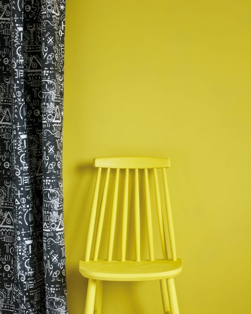 English Yellow Wall Paint by Annie Sloan, chair painted with Chalk Paint® in English Yellow and Tacit in Graphite curtain