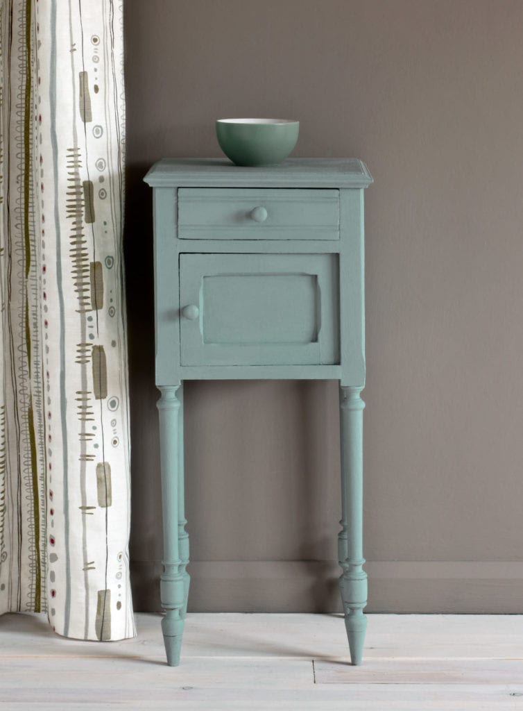 Chalk Paint® by Annie Sloan in Svenska Blue side table, a crisp and cool toned blue-grey, Piano in Olive curtain and French Linen Wall Paint