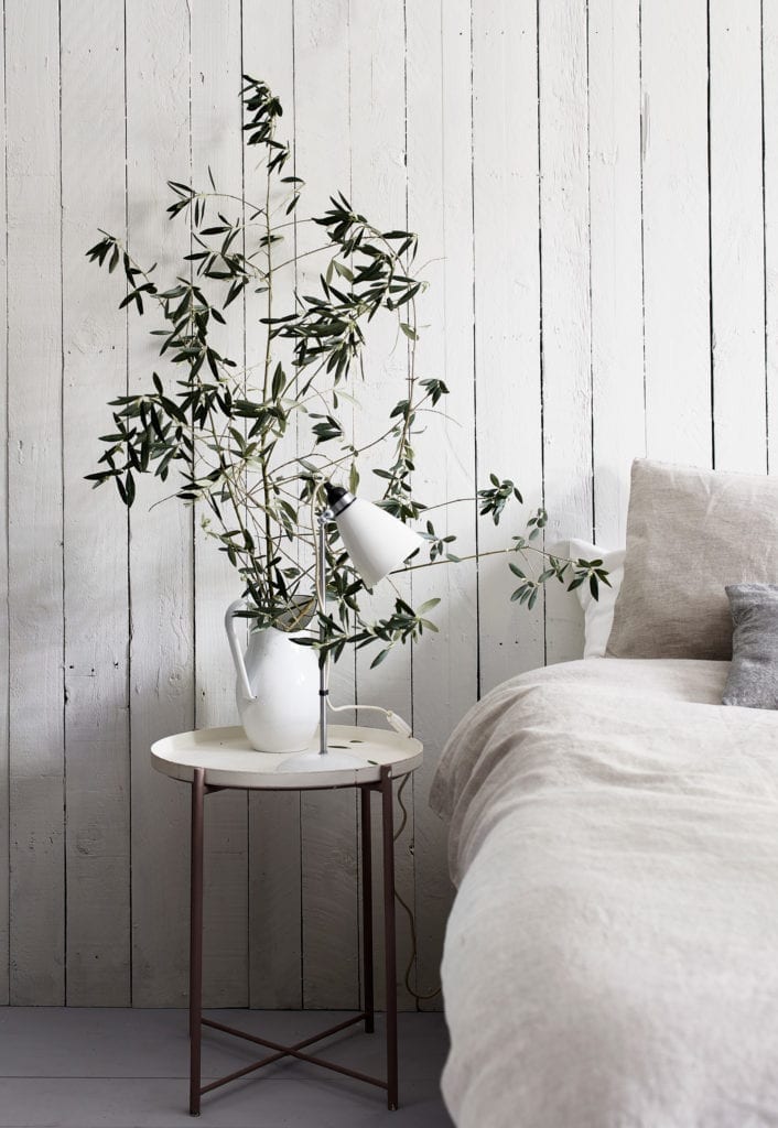 Neutral Scandinavian Bedroom painted with Chalk Paint® by Annie Sloan in Old White and fairy lights. Featuring Linen Union in Graphite + Old White