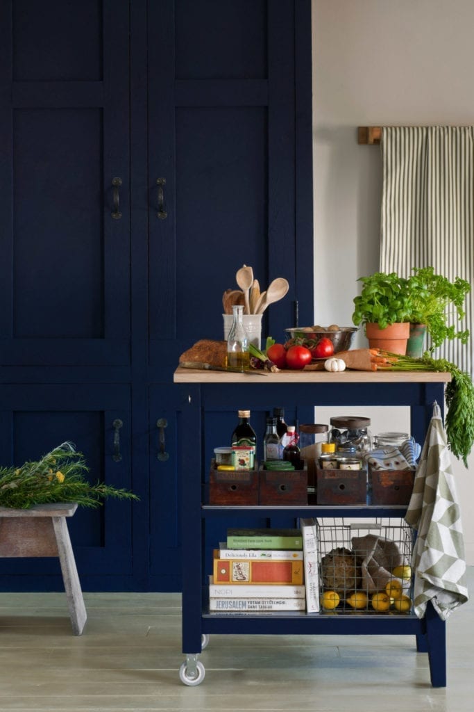 Kitchen cabinets and trolly painted with Chalk Paint® furniture paint by Annie Sloan in Oxford Navy, floor painted with Versailles