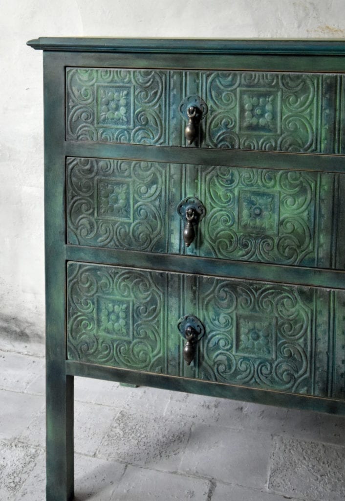 Textured wallpapered chest of drawers by Annie Sloan Painter in Residence Chloe Kempster painted with Chalk Paint® in Aubusson Blue, Antibes Green and Florence