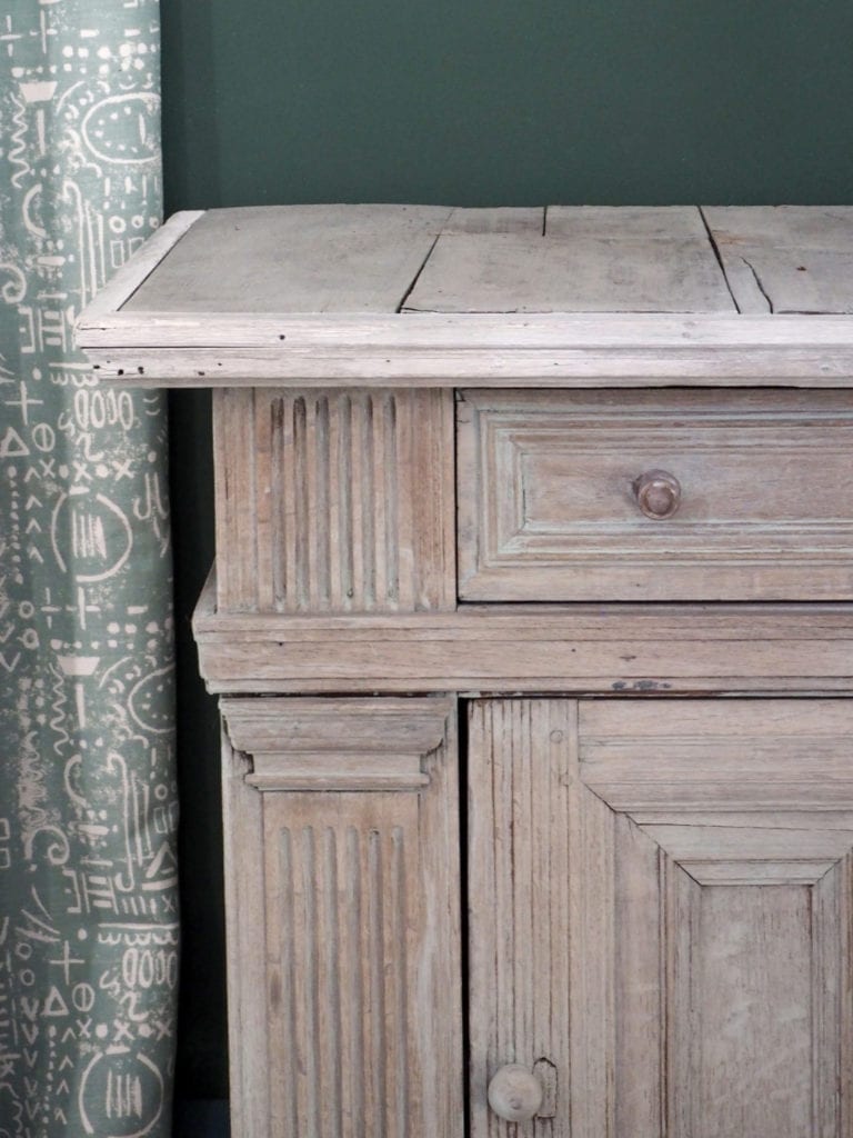 Washed oak cupboard with Chalk Paint® by Annie Sloan in Duck Egg Blue. Tacit in Duck Egg Blue curtain and Wall Paint in Amsterdam Green