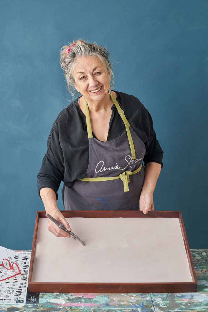 Annie Sloan painted the tray background in Antoinette Chalk Paint® using a Small Chalk Paint® Flat Brush for precision