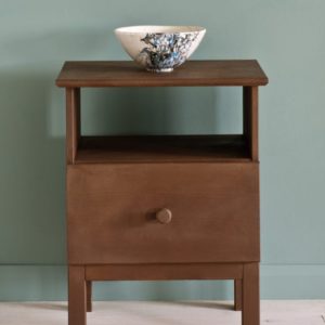 Side table painted with Chalk Paint® in Honfleur, a rich brown against a Duck Egg Blue wall