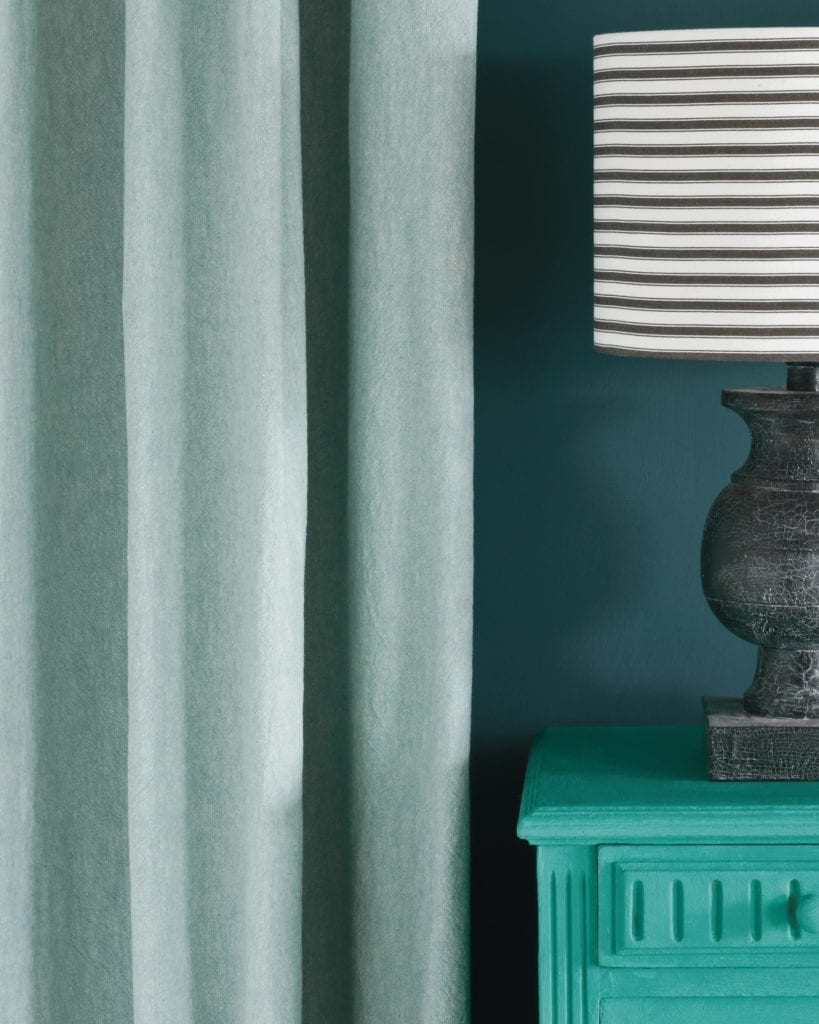 Linen Union fabric by Annie Sloan in Provence + Old White, Chalk Paint® in Florence side table, Ticking in Graphite lampshade and Wall Paint in Aubusson Blue