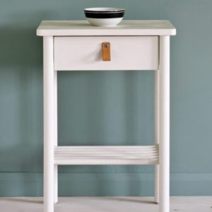 Side table painted with Chalk Paint® in Old White, a cool soft off-white, against a wall of Duck Egg Blue