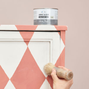 Annie Sloan Wax Brush and Clear Wax Used on Chequered Scandinavian Pink Furniture