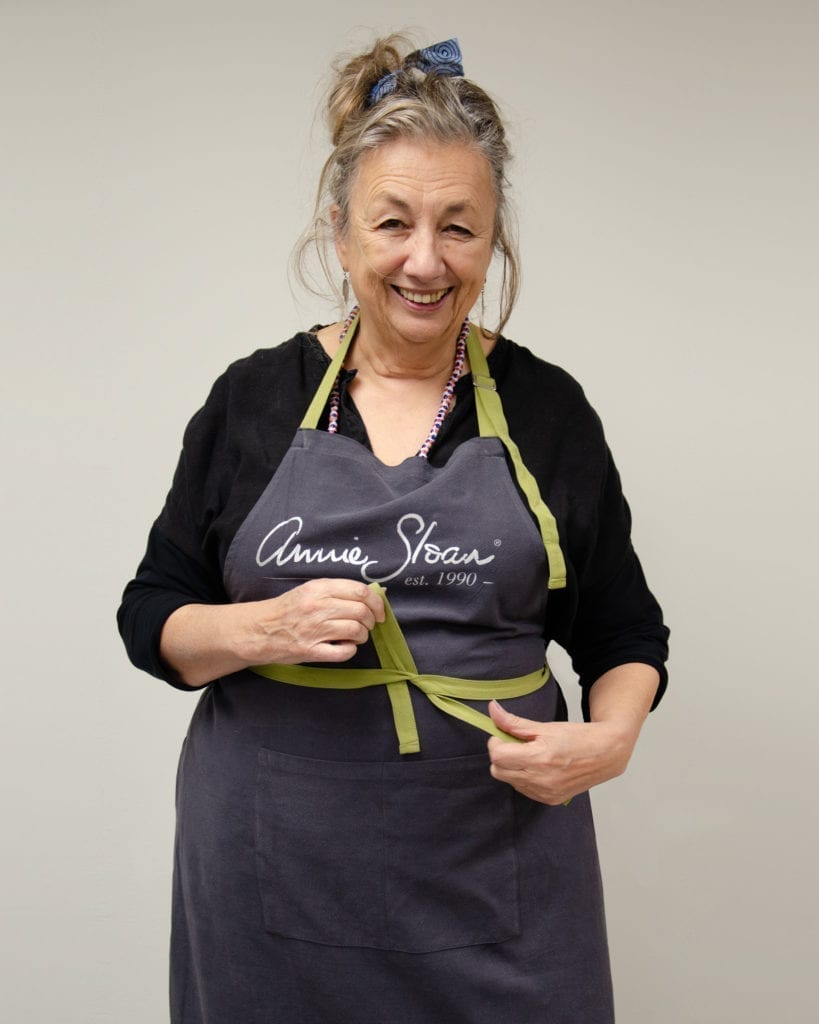 Annie tying the Annie Sloan Apron