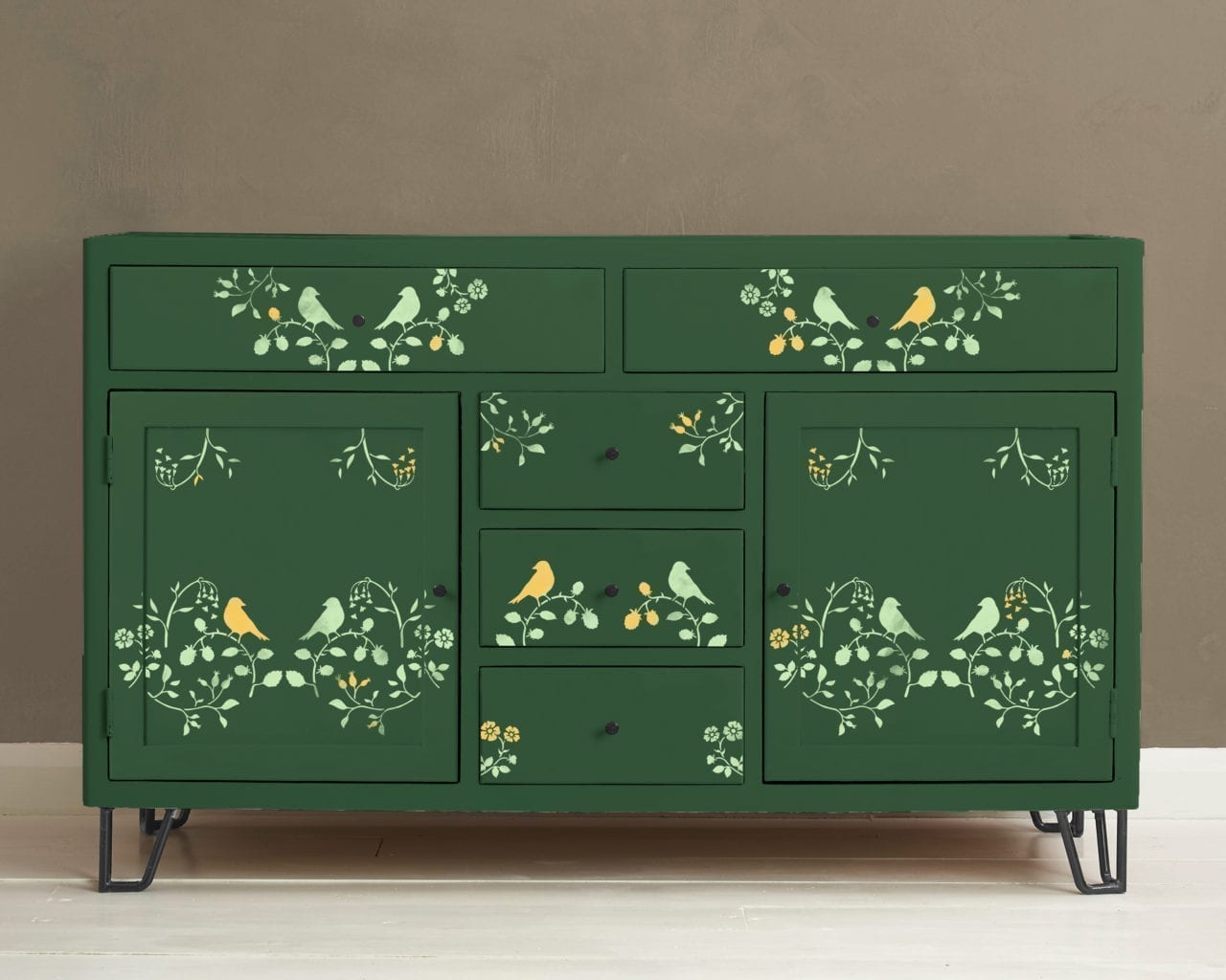 Chest of drawers painted with Chalk Paint® by Annie Sloan in Amsterdam Green and stencilled with the Countryside Bird Stencil