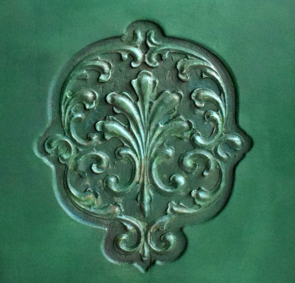 Amsterdam Green Cabinet by Annie Sloan Painter in Residence Ildiko Horvath painted with Chalk Paint® ornate distressed door detail