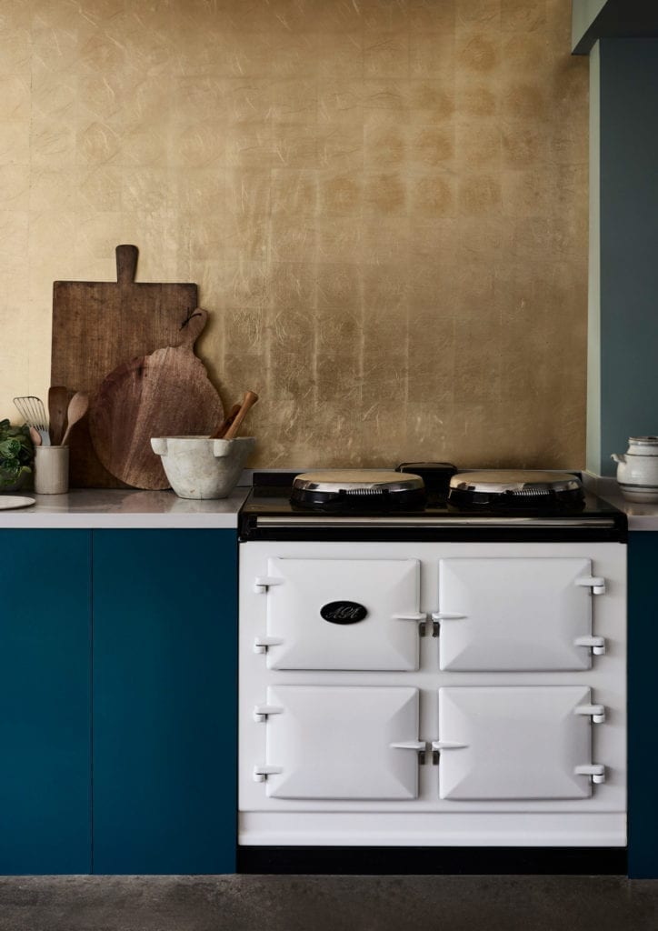 Kitchen painted with Chalk Paint® by Annie Sloan in Aubusson Blue with a gilded Imitation Gold Leaf splash-back