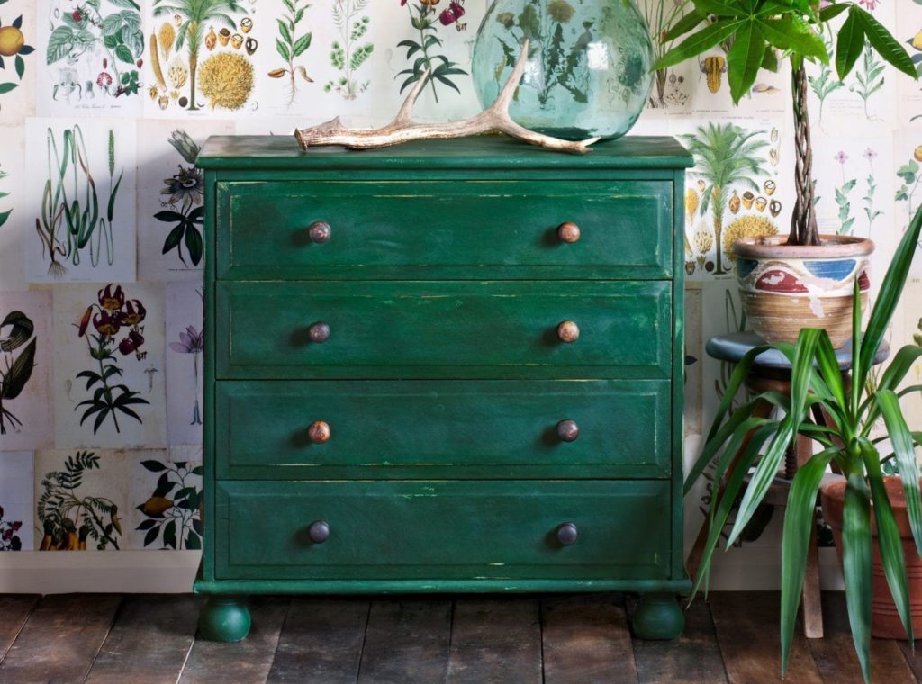 Chest of Drawers painted with Chalk Paint® by Annie Sloan in Amsterdam Green with botanical prints as wallpaper