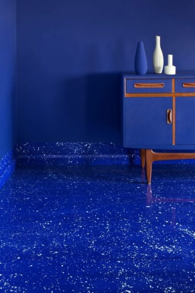 Floor, walls and G Plan chest painted with Chalk Paint® or Wall Paint by Annie Sloan in Napoleonic Blue splattered with Louis Blue and Lacquered with Gloss Lacquer