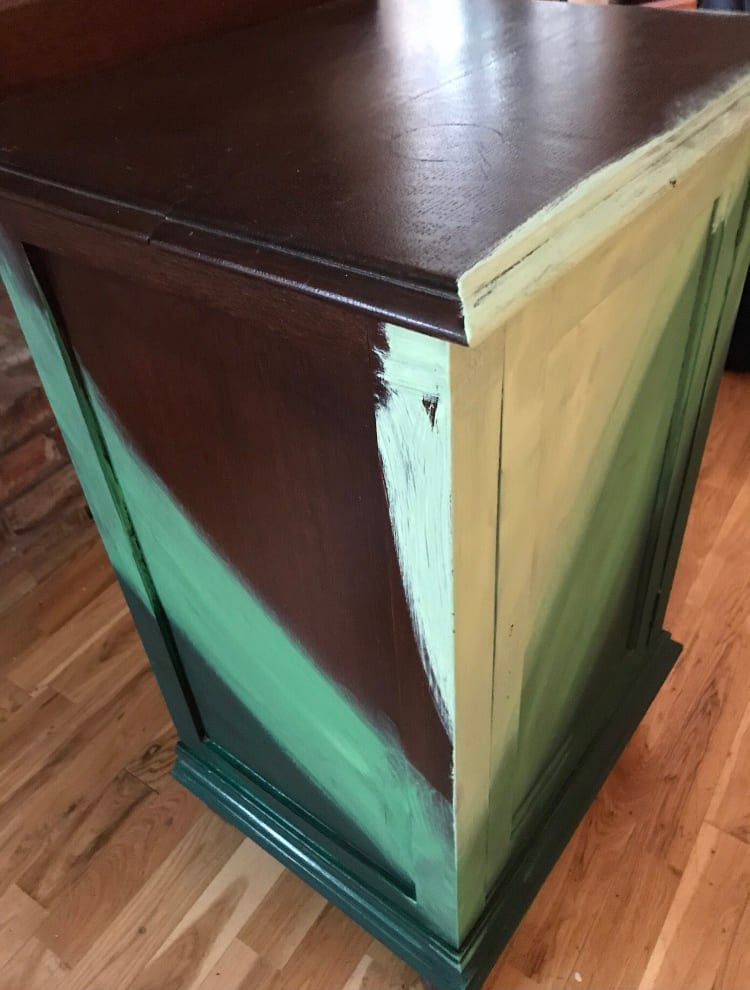 Green ombre distressed cabinet by Annie Sloan Painter in Residence Girl in Blue Designs painted with Chalk Paint® in Amsterdam Green, Antibes Green, and Lem Lem progress
