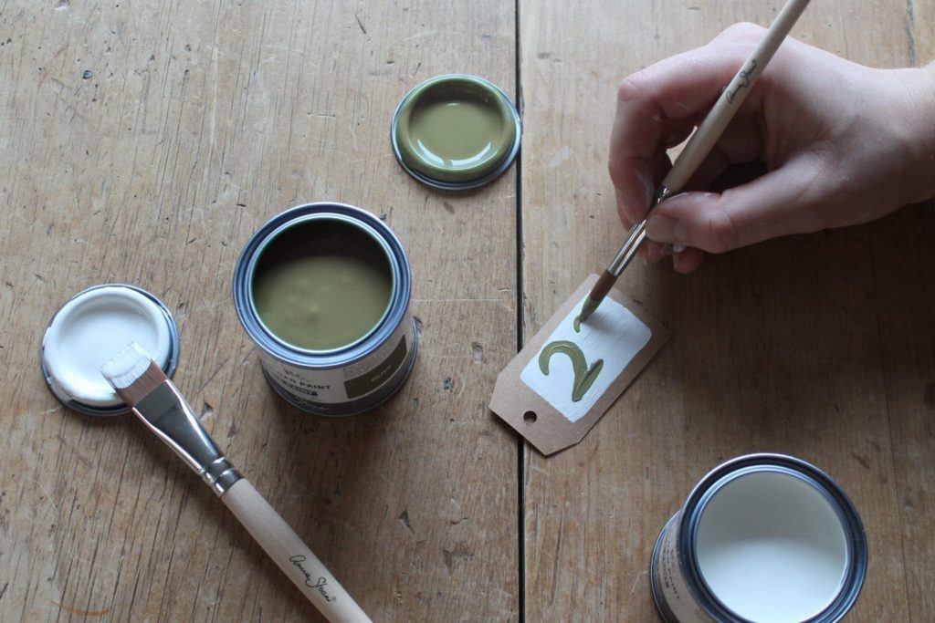 Parcel tags painted with Chalk Paint® by Annie Sloan in Old White and Olive for an advent calendar