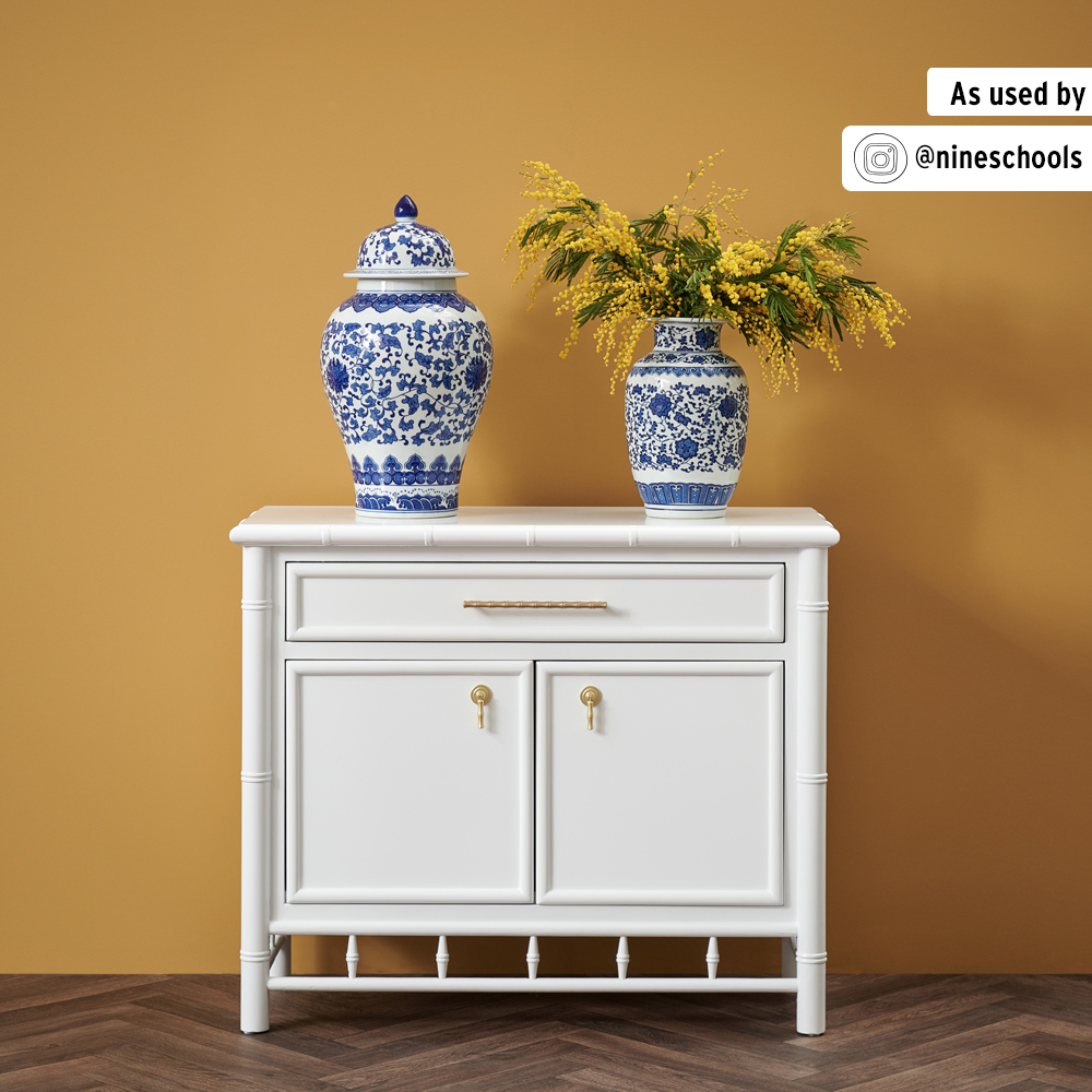 Annie Sloan Carnaby Yellow Wall Paint with Chest of Drawers and Decorative Vases in Foreground