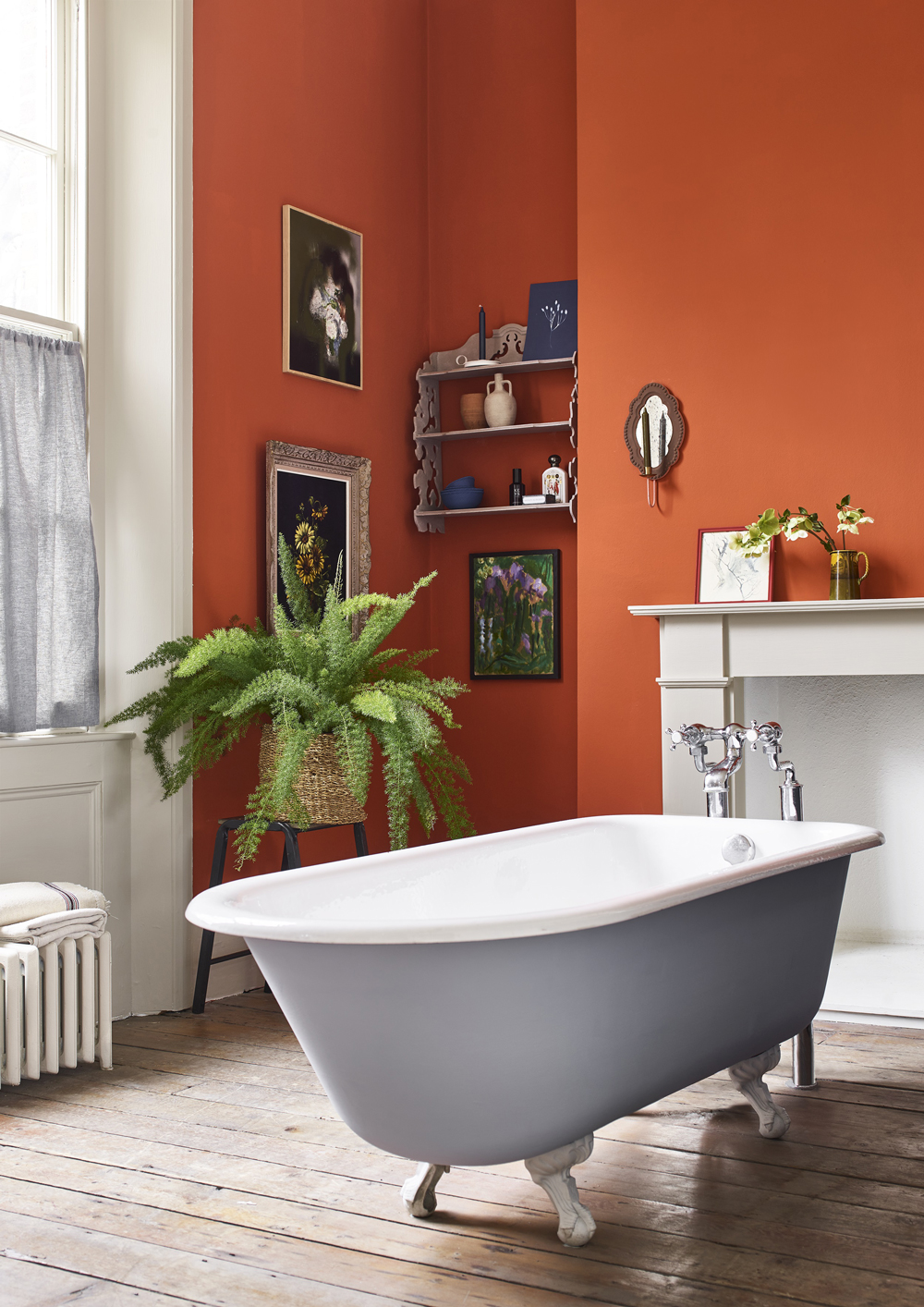Riad Terracotta Bathroom featuring Freestanding Bathtub in Louis Blue Chalk Paint and Trims in Canvas Satin Paint. Plant, Framed Painting, and Assorted Accessories