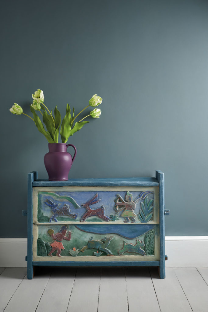 Annie Sloan Cambrian Blue Wall Paint with Chest in Foreground