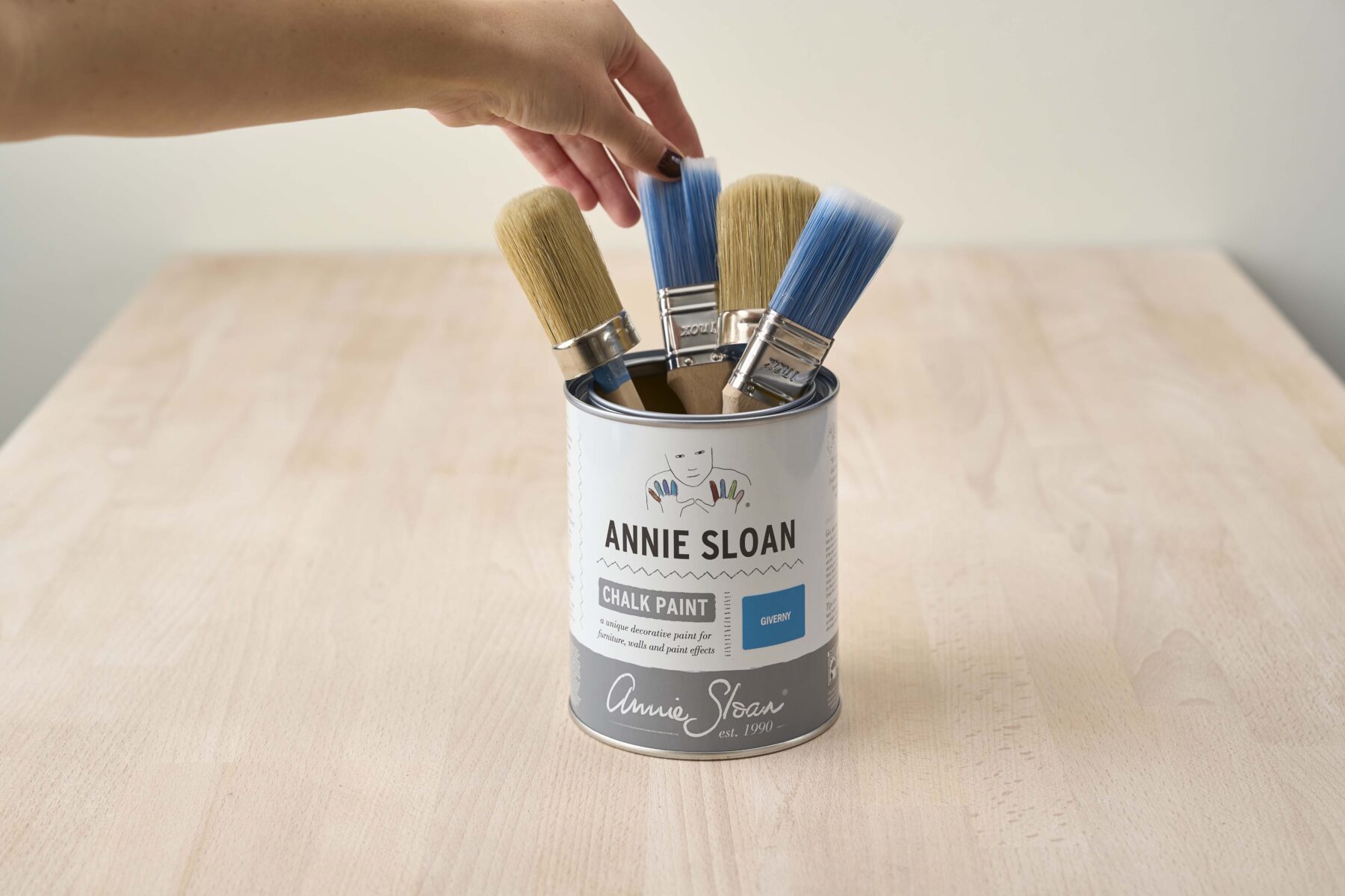 Annie Sloan Chalk Paint tin being used as a paint brush holder