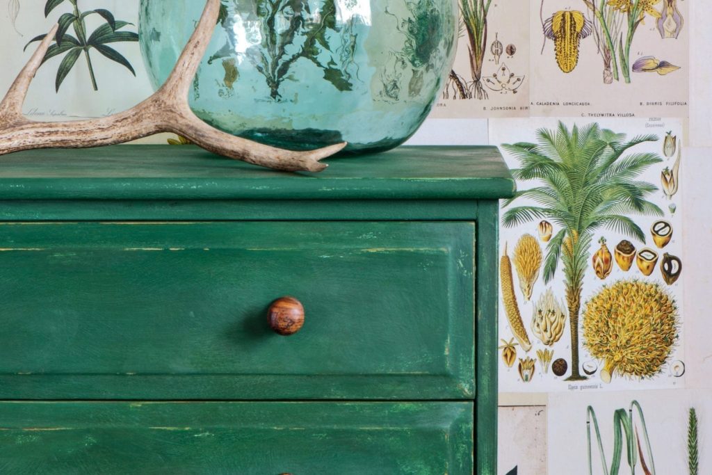 Chest of drawers painted with Chalk Paint by Annie Sloan in Amsterdam Green with botanical wall paper