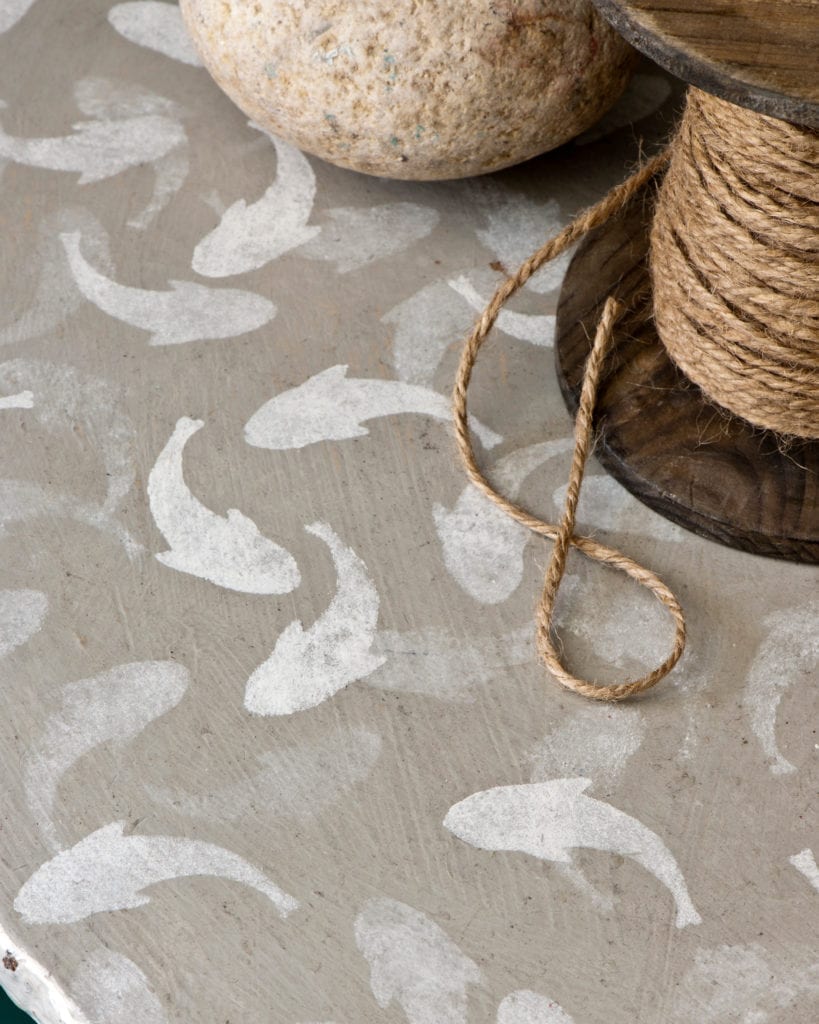 Coastal inspired room with table painted with Chalk Paint and Stencilled with Fish Stencil by Annie Sloan