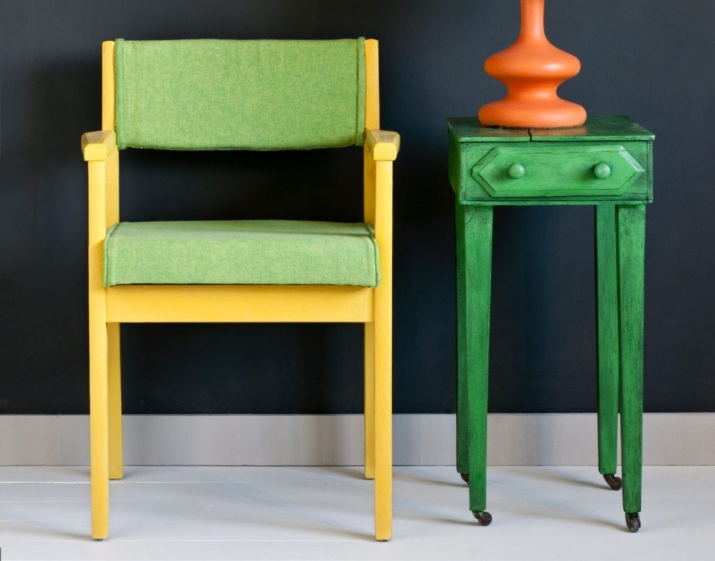 Antibes Green Black Wax Bohemian Warehouse Cabinet painted with Chalk Paint® by Annie Sloan. Chair in Linen Union in English Yellow + Antibes Green. Wall Paint in Graphite.
