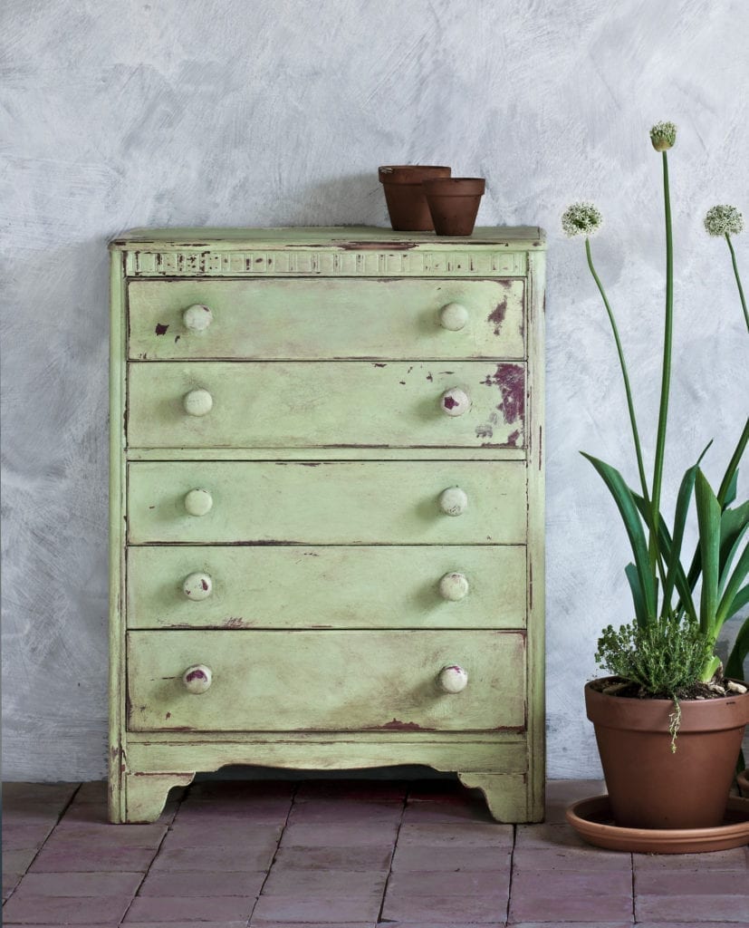 Chest of drawers painted with Chalk Paint® by Annie Sloan in Lem Lem, a soft, warm bright green, and sanded back for a distressed look. With alliums