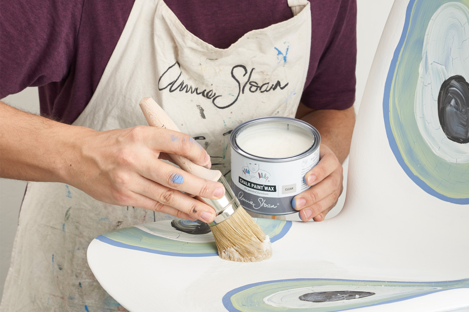 Felix Sloan demonstrating how to use wax on Chalk Paint®