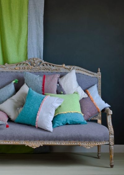 Gilded wood dry-brushed with Chalk Paint® by Annie Sloan on French Elegance sofa and Linen Union fabric cushions