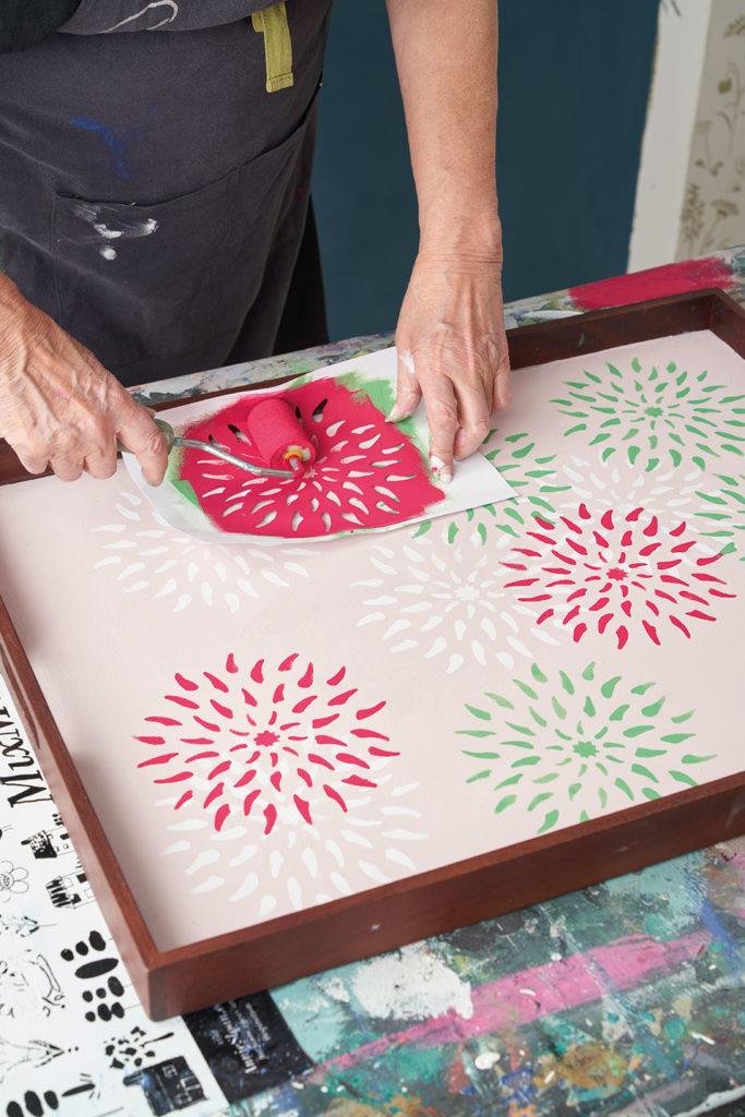 Annie Sloan adding a pop of Capri Pink Chalk Paint® using the Floral Stencil from The Colourist and a Small Sponge Roller
