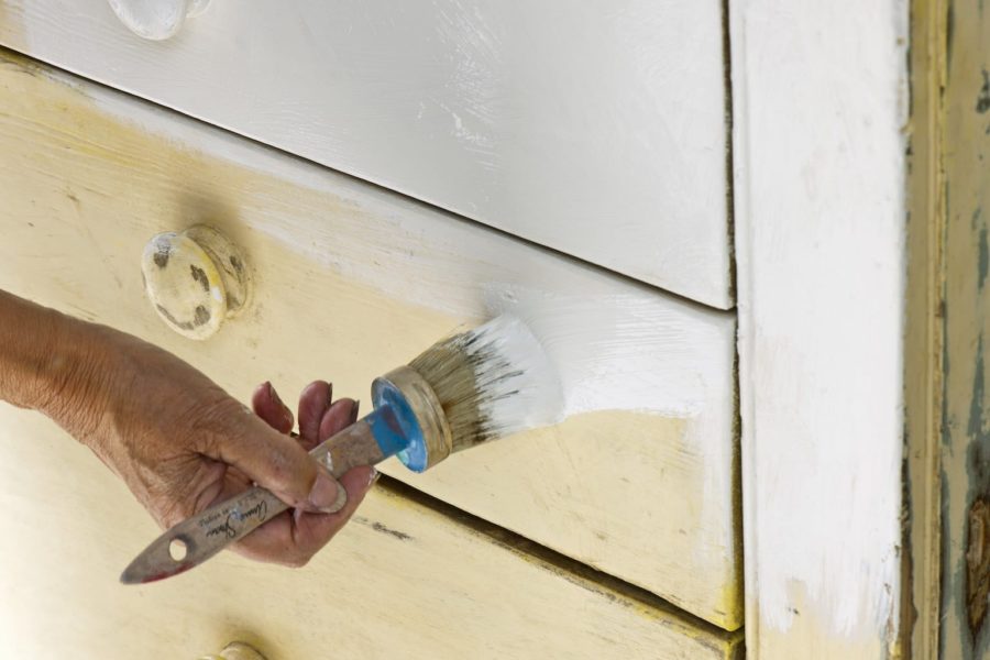 Annie Sloan Chalk Paint® Brush painting a chest of drawers to create the Shabby Chic effect