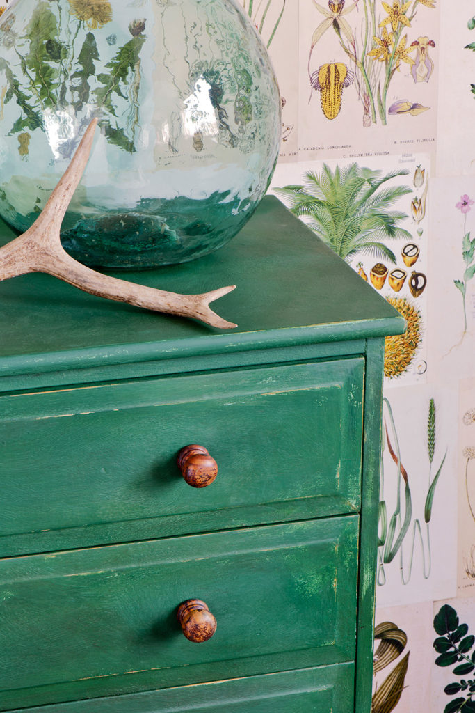 Close up of a chest of drawers pained in Amsterdam green Chalk Paint®