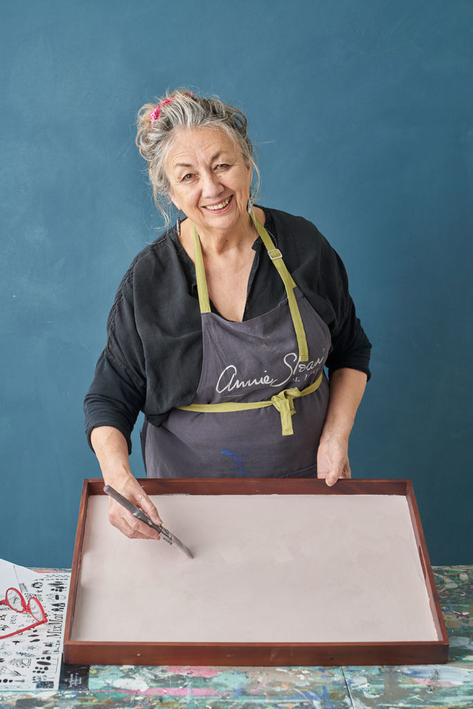 Annie Sloan painted the tray background in Antoinette Chalk Paint® using a Small Chalk Paint® Flat Brush for precision