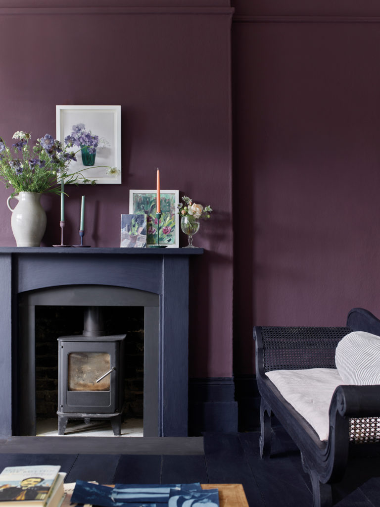 Annie Sloan Living Room in Tyrian Plum Wall Paint and featuring Oxford Navy Satin Paint on Fireplace and Trims