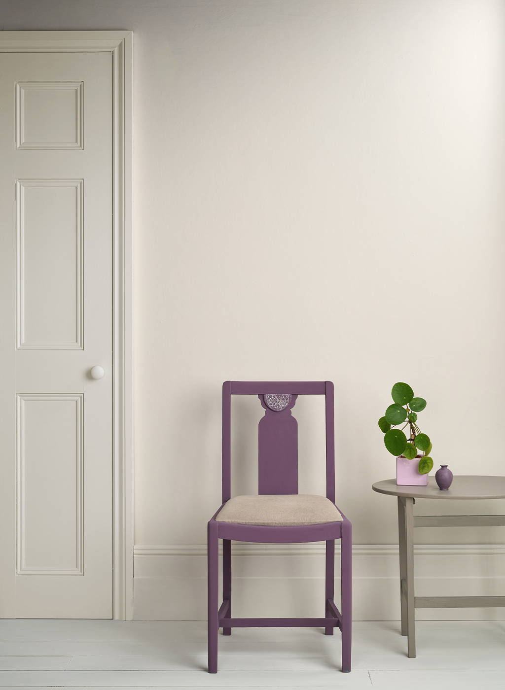 Lifestyle Image of Annie Sloan Satin Paint in Old White featuring painted door and skirting